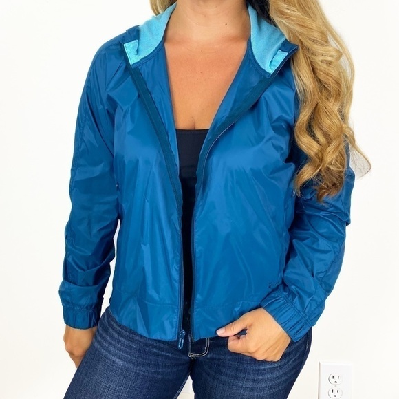 UA UNDER ARMOUR Teal Nylon Lightweight Windbreaker Jacket Loose Fit short medium - Picture 1 of 5
